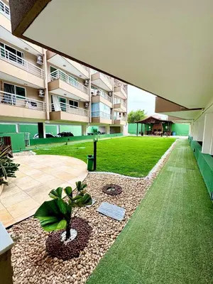 Um jardim no exterior de Elegance Residences Cumbuco