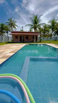 A piscina em ou perto de Recanto do Aconchego