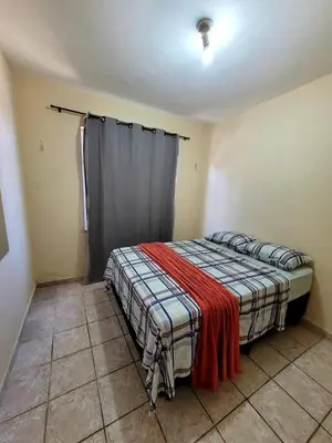 Uma cama ou camas num quarto em Spacious Apartment Close to Praia do Futuro