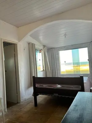 Uma cama ou camas num quarto em Casa Pé na Areia - Com PISCINA, CHURRASQUEIRA E VISTA PRIVILEGIADA - Beberibe