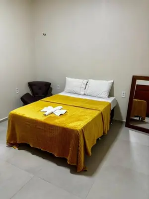 Uma cama ou camas num quarto em Casa Bons Ventos Preá