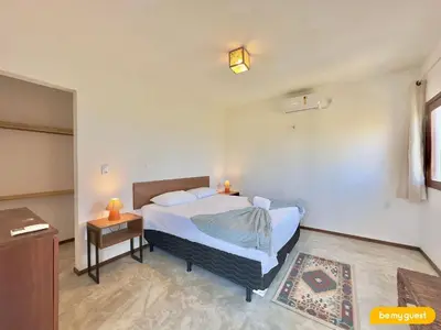 Uma cama ou camas num quarto em Reserva BeachFront - Retirinho