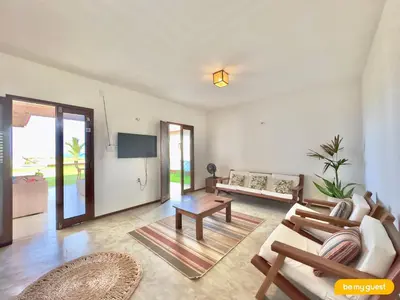 Uma televisão e/ou sistema de entretenimento em Reserva BeachFront - Retirinho