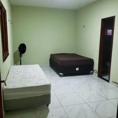 Uma cama ou camas num quarto em Casa paraíso natural