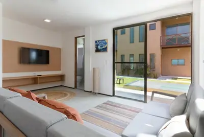 Uma televisão e/ou sistema de entretenimento em Beachfront Duplex #A6 - Aquiráz By Carpediem
