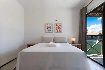 Uma cama ou camas num quarto em Beachfront Duplex #A6 - Aquiráz By Carpediem
