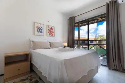 Uma cama ou camas num quarto em Beachfront Duplex #A6 - Aquiráz By Carpediem