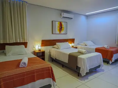 Uma cama ou camas num quarto em Oasis by Vila Coqueiros Cumbuco