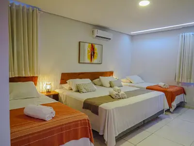 Uma cama ou camas num quarto em Oasis by Vila Coqueiros Cumbuco