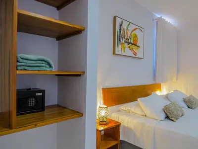 Uma cama ou camas num quarto em Oasis by Vila Coqueiros Cumbuco