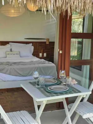 Uma cama ou camas num quarto em Chalé Koa Flora - PRAIA DE MOITAS