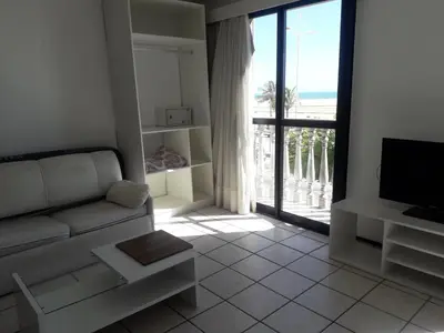 Uma televisão e/ou sistema de entretenimento em Classic Residence Beira Mar