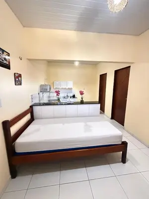 Uma cama ou camas num quarto em Pousada ExtraLar