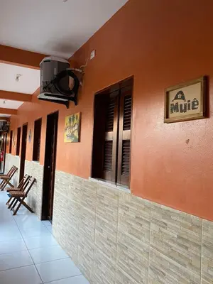 Uma televisão e/ou sistema de entretenimento em Pousada ExtraLar