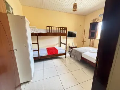 Uma cama ou camas num quarto em Pousada ExtraLar