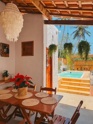 A piscina em ou perto de Maré Mansa Suítes Icaraizinho