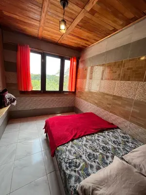 Uma cama ou camas num quarto em Casa Refúgio do Alto