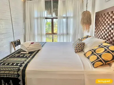 Uma cama ou camas num quarto em Vila Pukara - Moitas