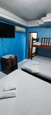 Uma cama ou camas num quarto em Pousada Sol de Iracema Praia