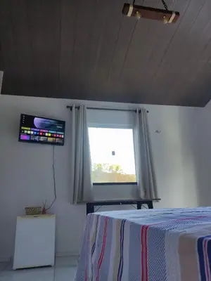 Uma televisão e/ou sistema de entretenimento em Chalé Bella Vista