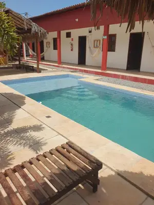A piscina em ou perto de Maruá Pousada da Lagoa
