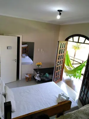 Uma cama ou camas num quarto em Sunrise Apartamentos