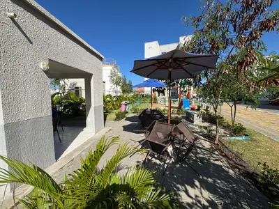 Um jardim no exterior de Apartamento completo ótima localização! Elevador