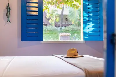 Uma cama ou camas num quarto em Villa Blu Jeri