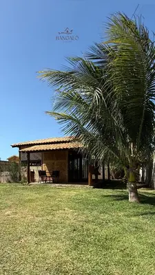 Um jardim no exterior de Bangalô raizes
