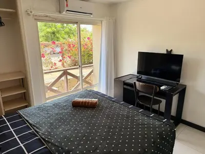 Uma televisão e/ou sistema de entretenimento em Eco Paradise 126 Cumbuco - Um refúgio à beira-mar