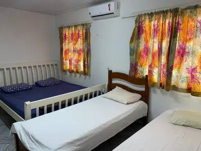 Uma cama ou camas num quarto em Casa no cumbuco