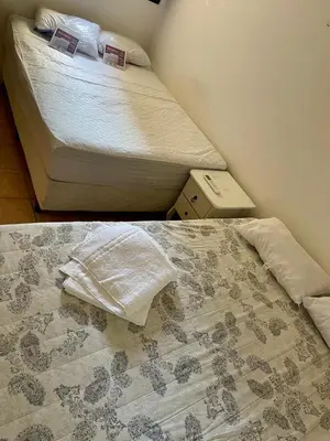Uma cama ou camas num quarto em Apto EnCanto do Mar - Apenas 50m da praia e piscinas! Aquaville Resort