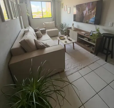 Uma área de estar em Apartamento em Fortaleza