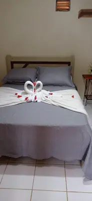 Uma cama ou camas num quarto em Casa na Serra