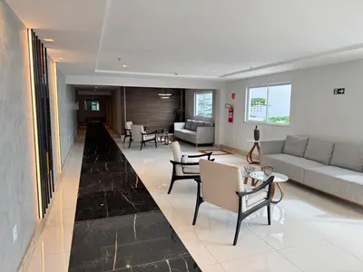 Uma área de estar em Incrível cobertura para família com 2 quartos e ar