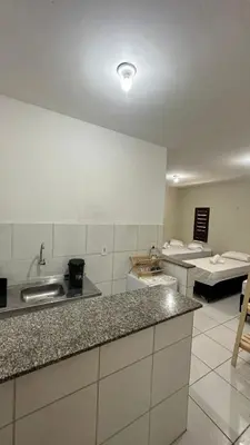 A cozinha ou kitchenette de Garden Flat Beach - 102