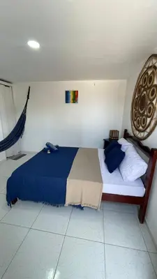 Uma cama ou camas num quarto em Suíte Mykonos Canoa Quebrada- Ao lado da Broadway