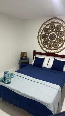 Uma cama ou camas num quarto em Suíte Mykonos Canoa Quebrada- Ao lado da Broadway