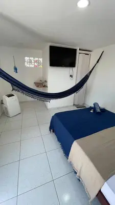 Uma cama ou camas num quarto em Suíte Mykonos Canoa Quebrada- Ao lado da Broadway