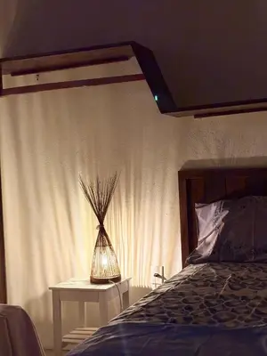 Uma cama ou camas num quarto em Casa velha