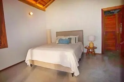 Uma cama ou camas num quarto em Family and Kitesurfing Paradise by the Sea