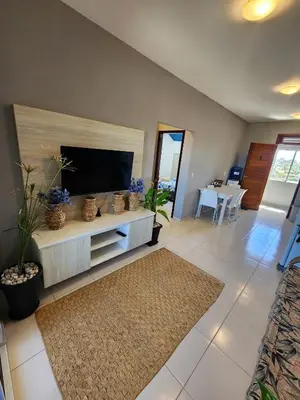 Uma televisão e/ou sistema de entretenimento em Cumbuco Residence - O Rei Do Cumbuco