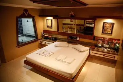 Uma cama ou camas num quarto em Bali Motel (Adults Only)