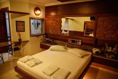 Uma cama ou camas num quarto em Bali Motel (Adults Only)