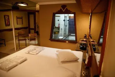 Uma cama ou camas num quarto em Bali Motel (Adults Only)