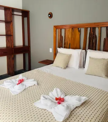 Uma cama ou camas num quarto em Hotel Fazenda Alta Vista