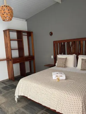 Uma cama ou camas num quarto em Hotel Fazenda Alta Vista