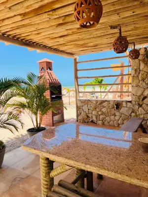 Uma varanda ou terraço em Chalet Paraiso Canoa 3 na praia - Canoa Quebrada