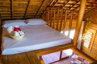 Uma cama ou camas num quarto em Chalet Paraiso Canoa 3 na praia - Canoa Quebrada