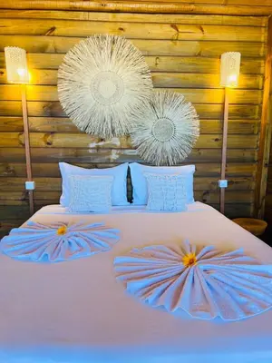 Uma cama ou camas num quarto em Chalet Paraiso Canoa 3 na praia - Canoa Quebrada